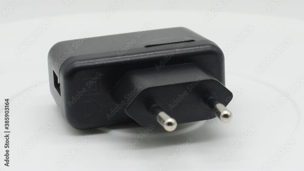 Charging adapter on white background Charging adapter on white background