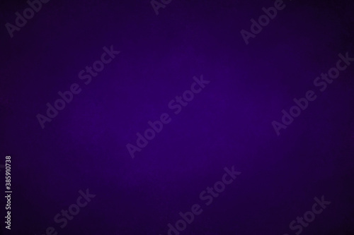 abstract text wall covered with paint, dark purple studio background