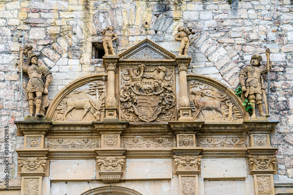 Carvings of soldiers above the gate entrancu to the medieval castle of Tübingen, Baden-Württemberg, Germany