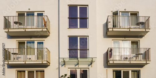 Balconies and windows of a residential building photo