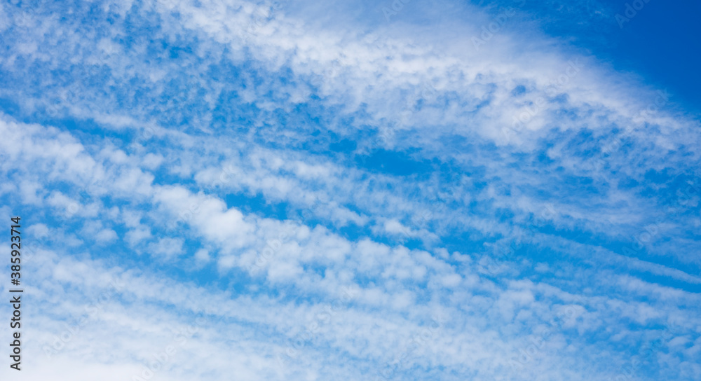 beautiful ribbed clouds on a beautiful, blue sky. Background, texture beautiful ribbed clouds on a beautiful, blue sky. Background, texture