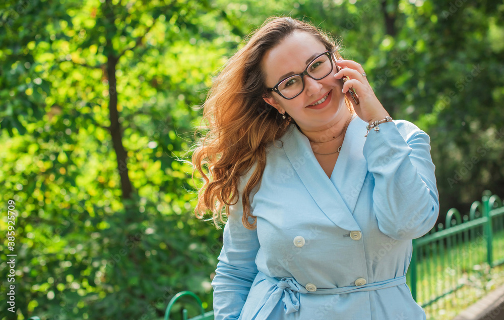 Portrait of American plus size businesswoman in light blue suit, citizen lifestyle, concept of women's life Portrait of American plus size businesswoman in light blue suit, citizen lifestyle, concept of women's life