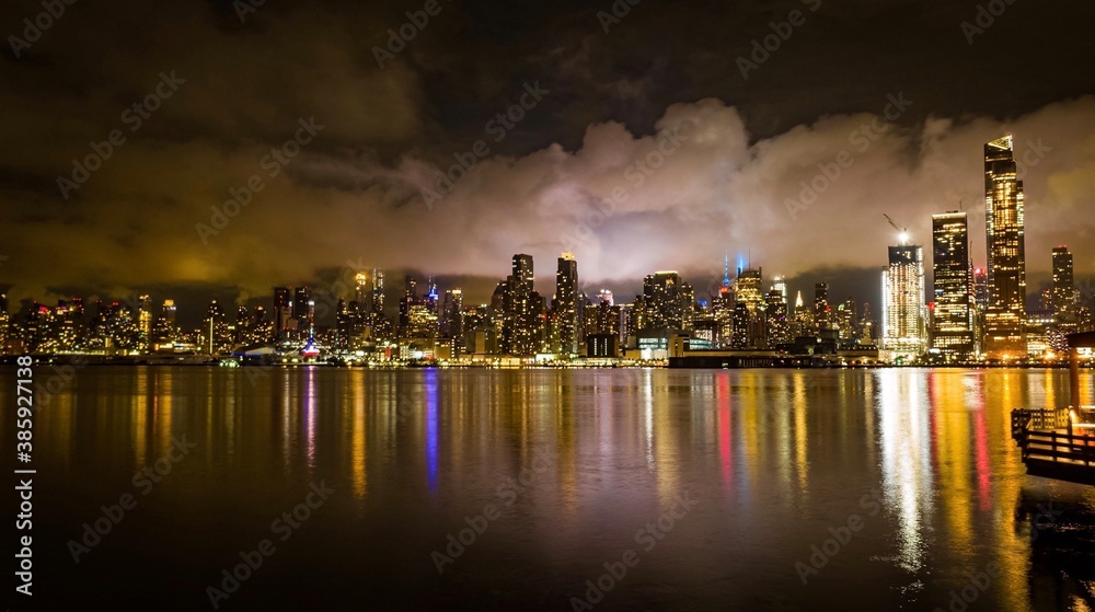 city harbor at night, Manhattan skyline, nyc, aerial photography, drone imaging, ocean, night time, city lights, dawn, amazing views 
