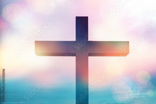 Christian cross with colorful bokeh lights