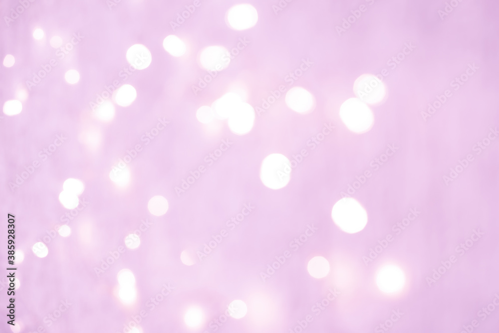 abstract background. light pink blurry lights. bokeh. texture. concept for christmas, new year, holiday