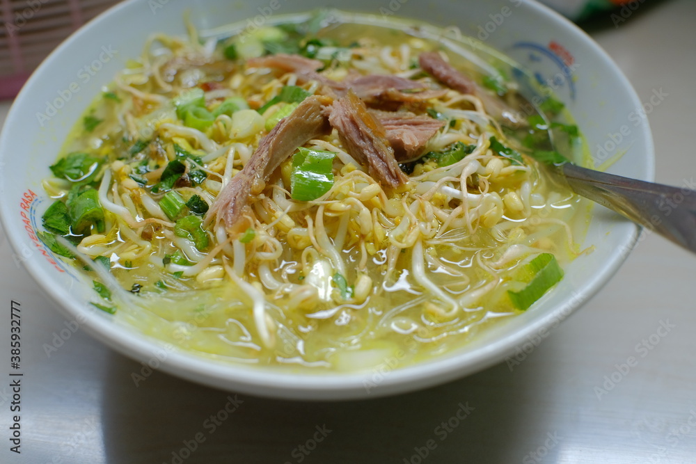 Soto ayam - Indonesian specialties made from vegetables and chicken, delicious chicken soup is ready to eat Soto ayam - Indonesian specialties made from vegetables and chicken, delicious chicken soup is ready to eat