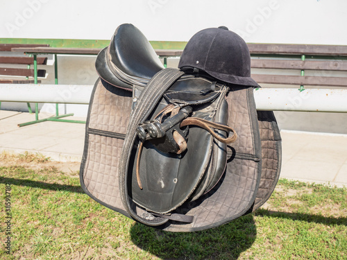 Comfortable leather saddle and equestrian equipment photo
