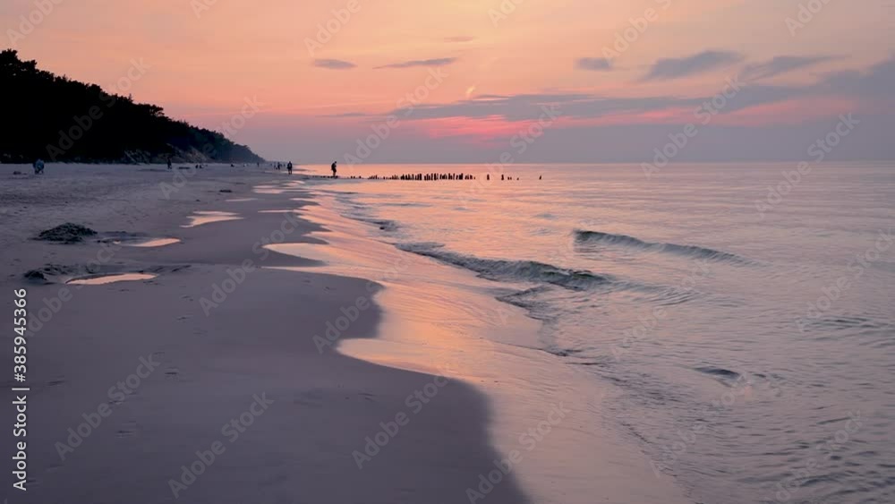 Sunset over in Debki village on the Baltic Sea coast, Puck County, Pomerania region of Poland Sunset over in Debki village on the Baltic Sea coast, Puck County, Pomerania region of Poland