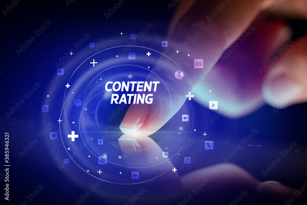 Finger touching tablet with social media icons and CONTENT RATING Finger touching tablet with social media icons and CONTENT RATING