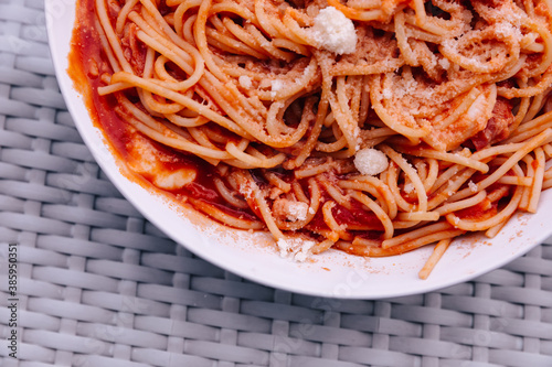 traditional italian food. close up of pasta in tomato sauce with