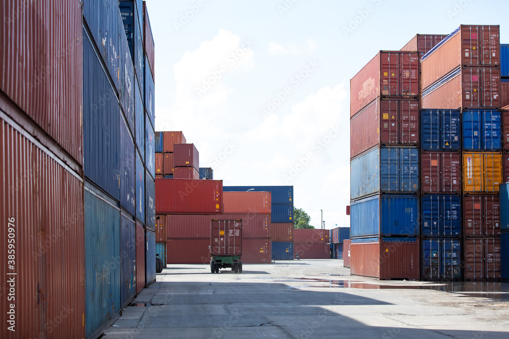 Marine and carrier insurance concept. Cargo container yard. cargo shipping container box in logistic shipping yard. colorful cargo container stacks in shipping port. Marine and carrier insurance concept. Cargo container yard. cargo shipping container box in logistic shipping yard. colorful cargo container stacks in shipping port.