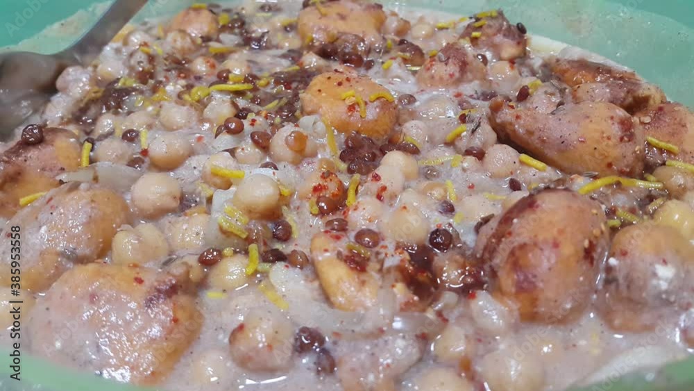 Closeup view of fresh tasty and spicy homemade channa chaat dish. Chaat is traditional dish in South Asian countries Closeup view of fresh tasty and spicy homemade channa chaat dish. Chaat is traditional dish in South Asian countries
