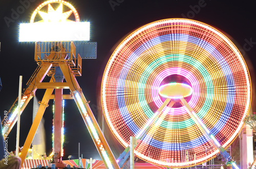 Ferris wheel at night at the fair  photo