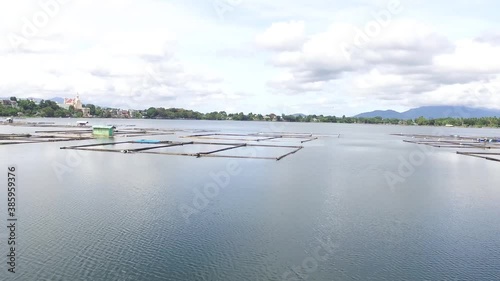 Sampaloc lake fish cages drone aerial video tracking shot photo