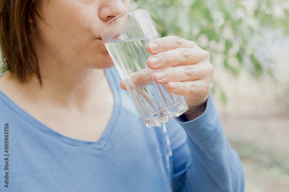 Woman drinking fresh water. Healthy lifestyle concept. Woman drinking fresh water. Healthy lifestyle concept.