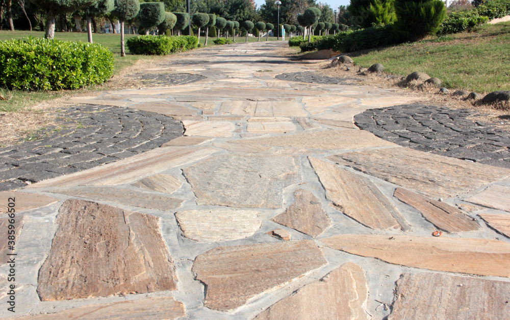 
decorative stone pavement road in the park