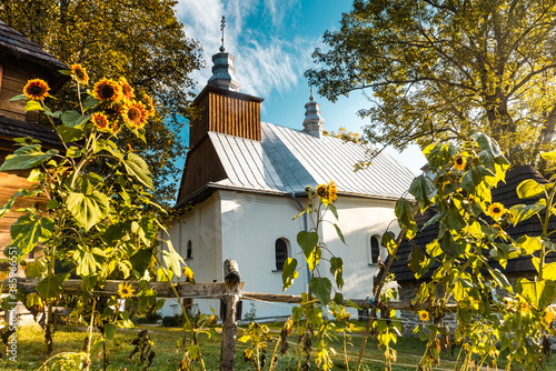 Fototapeta Naklejka Na Ścianę i Meble -  Lopienka Church near Bieszczady Mountains in Poland. Beautiful Architecture in Majestic Landscape