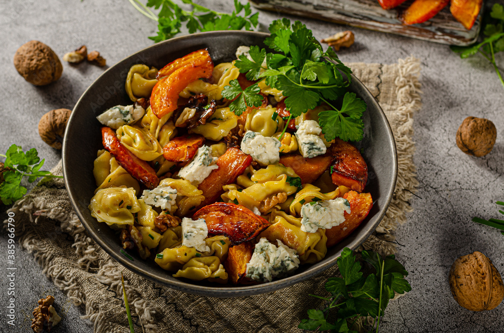 Homemade pasta with roasted pumpkin and blue cheese