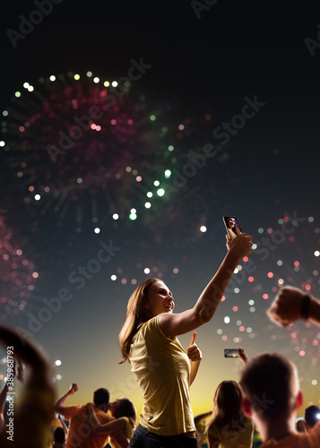 Fans celebrate in Stadium Arena night fireworks © Anna Stakhiv