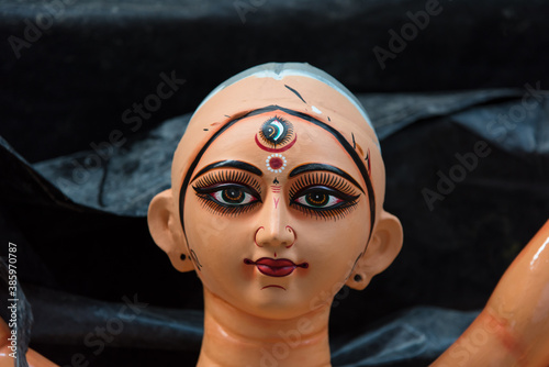 Close up of an incomplete face of Hindu Goddess Durga photo