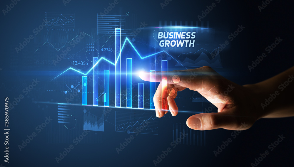 Hand touching BUSINESS GROWTH button, business concept Hand touching BUSINESS GROWTH button, business concept