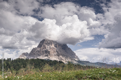 Monte Pelmo  a mountain of the Dolomites  resembles a giant rock  isolated from other peaks  as seen from Col dei Baldi  Baldi pass  above Alleghe village  Province of Belluno  South Tirol  Italy.