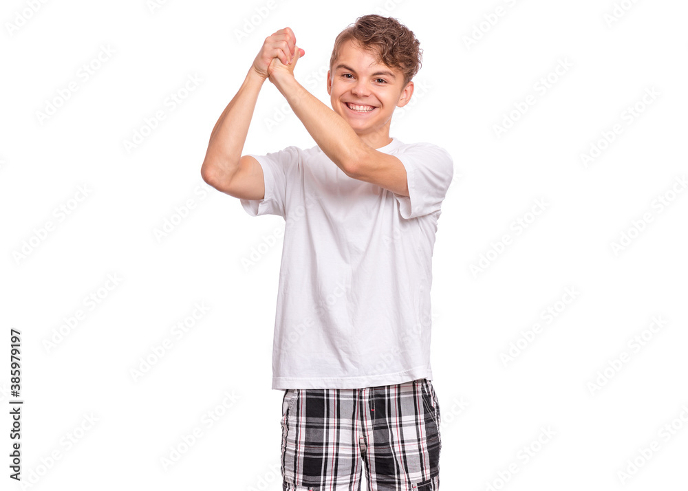 Happy boy showing victory sign isolated on white background Happy boy showing victory sign isolated on white background