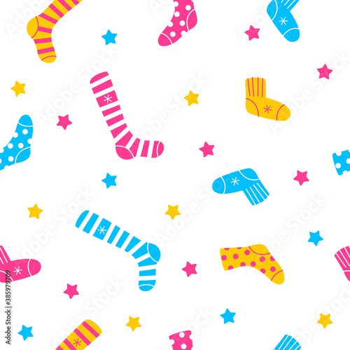 Seamless pattern with knitted woolen socks, stockings and knee socks - background for funny winter design