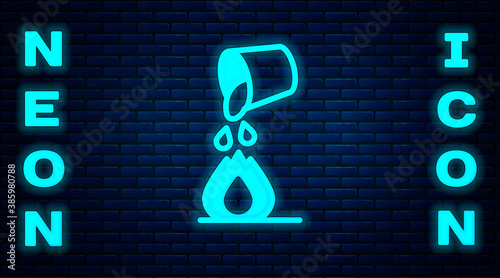 Glowing neon Water bucket extinguishing a fire icon isolated on brick wall background. Vector.