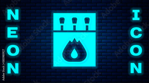 Glowing neon Open matchbox and matches icon isolated on brick wall background. Vector.