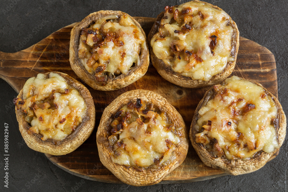 mushrooms baked with cheese and onions. mushrooms baked with cheese and onions.