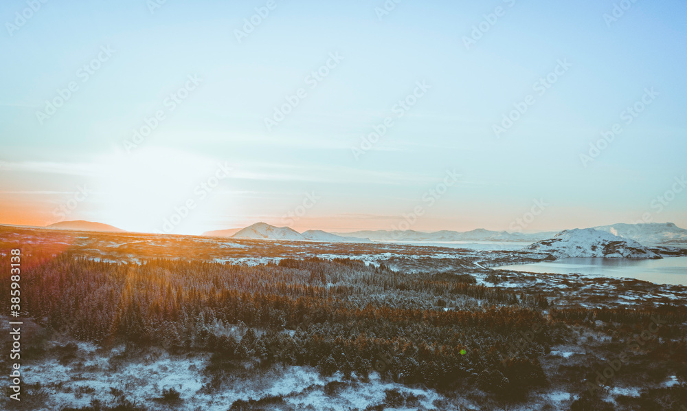 Winter sunrise in the mountains. Þingvellir National Park