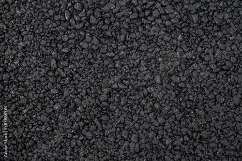 Close - up Black asphalt floor texture and seamless background