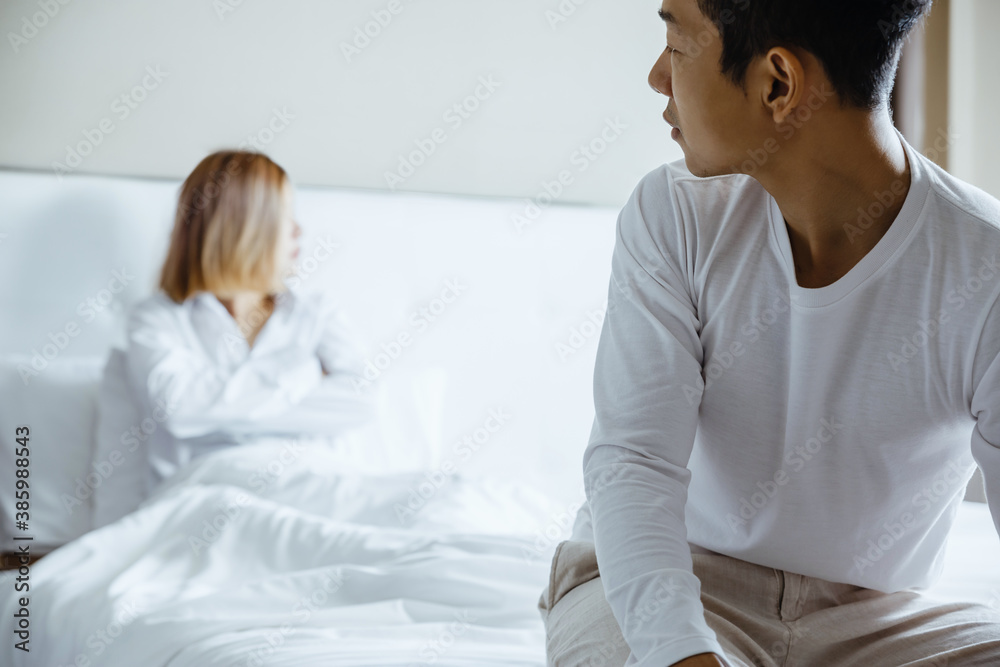 Upset couple in bed, relationship problems concept. Upset couple in bed, relationship problems concept.