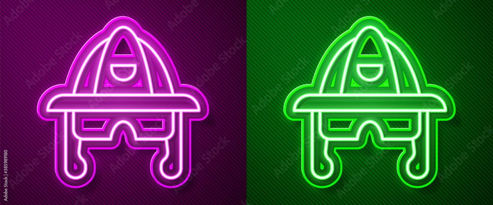 Glowing neon line Firefighter helmet or fireman hat icon isolated on purple and green background. Vector.