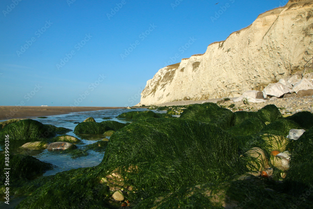 The beaches under the high white  cliffs on the shore of the Channel at Escalles in France 