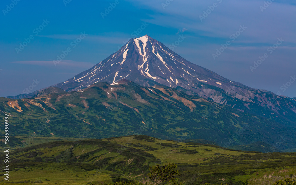 Panoramic view of the volcano against the blue sky