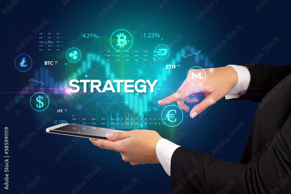 Close-up of a touchscreen with STRATEGY inscription, business opportunity concept Close-up of a touchscreen with STRATEGY inscription, business opportunity concept