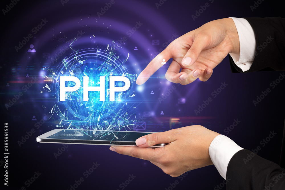 Close-up of a touchscreen with PHP abbreviation, modern technology concept Close-up of a touchscreen with PHP abbreviation, modern technology concept