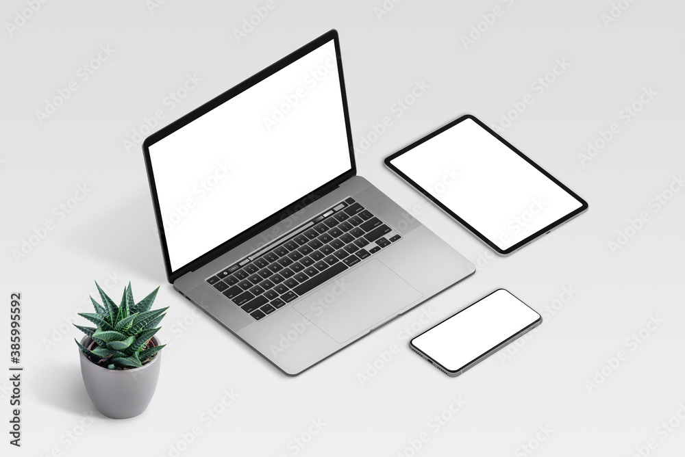 Laptop, tablet and smart phone mockup on white office desk. Isometric position. Isolated, blank screens for app or web site design promotion Laptop, tablet and smart phone mockup on white office desk. Isometric position. Isolated, blank screens for app or web site design promotion