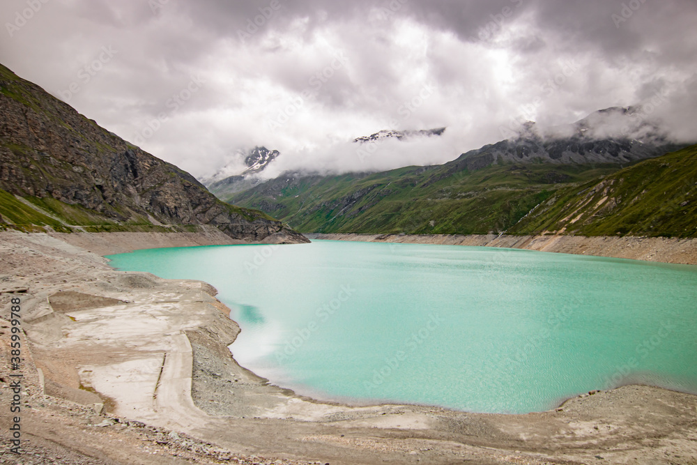 Aerial view of glacier lake at Lac de Moiry in the Swiss Alps. At Grimentz Vallis, CH Switzerland.