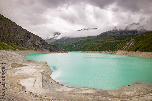 Aerial view of glacier lake at Lac de Moiry in the Swiss Alps. At Grimentz Vallis, CH Switzerland. photo