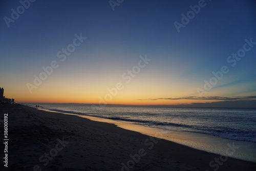 The glow of sunrise by the sea