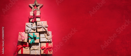 2020 Merry Christmas and New Year holidays background. Gift box with bow.