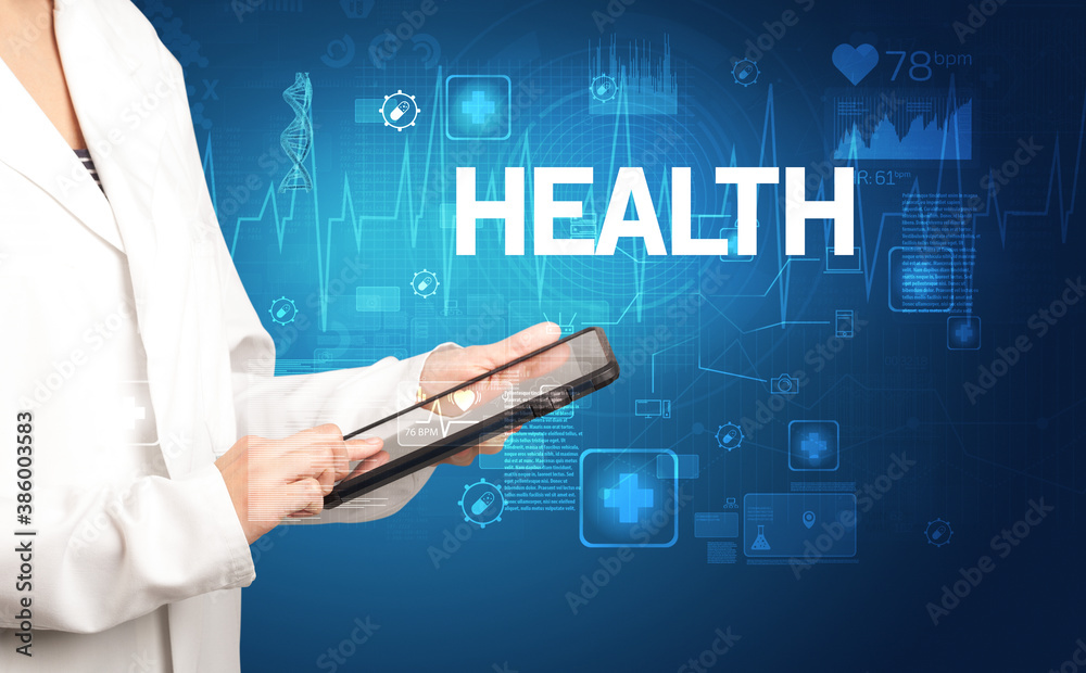 young doctor writing down notes with HEALTH inscription, healthcare concept young doctor writing down notes with HEALTH inscription, healthcare concept