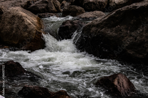 River flows over rocks in this beautiful scene