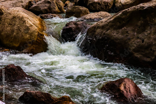 River flows over rocks in this beautiful scene