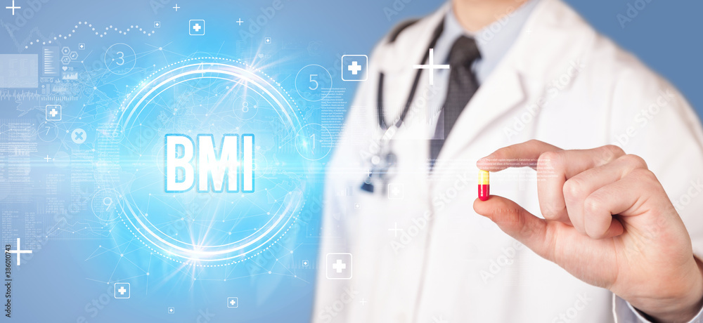 Close-up of a doctor giving you a pill with BMI abbreviation, virology concept Close-up of a doctor giving you a pill with BMI abbreviation, virology concept