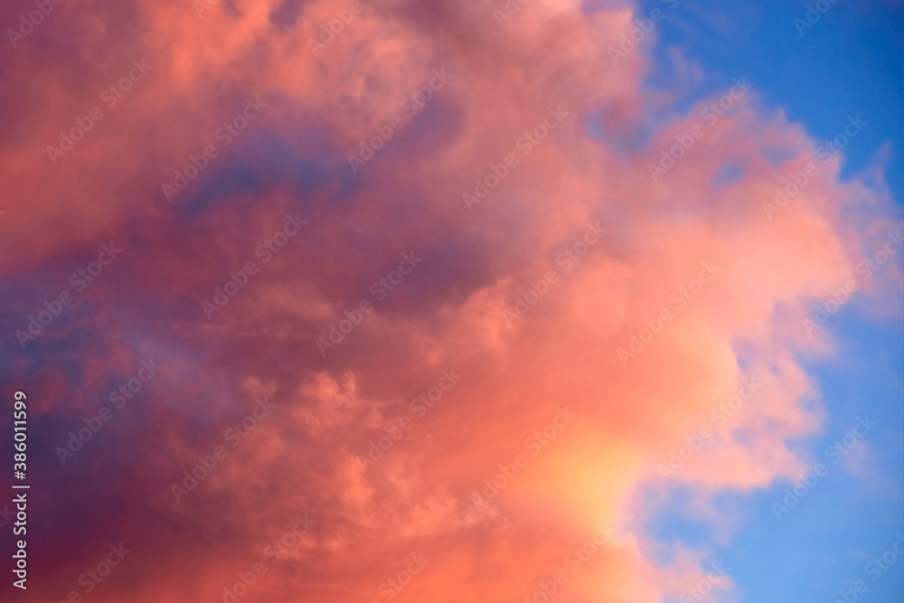 Beautiful landscape, fluffy pink clouds of pastel colors.