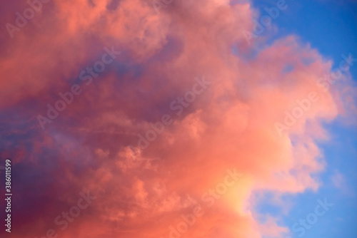 Beautiful landscape, fluffy pink clouds of pastel colors.